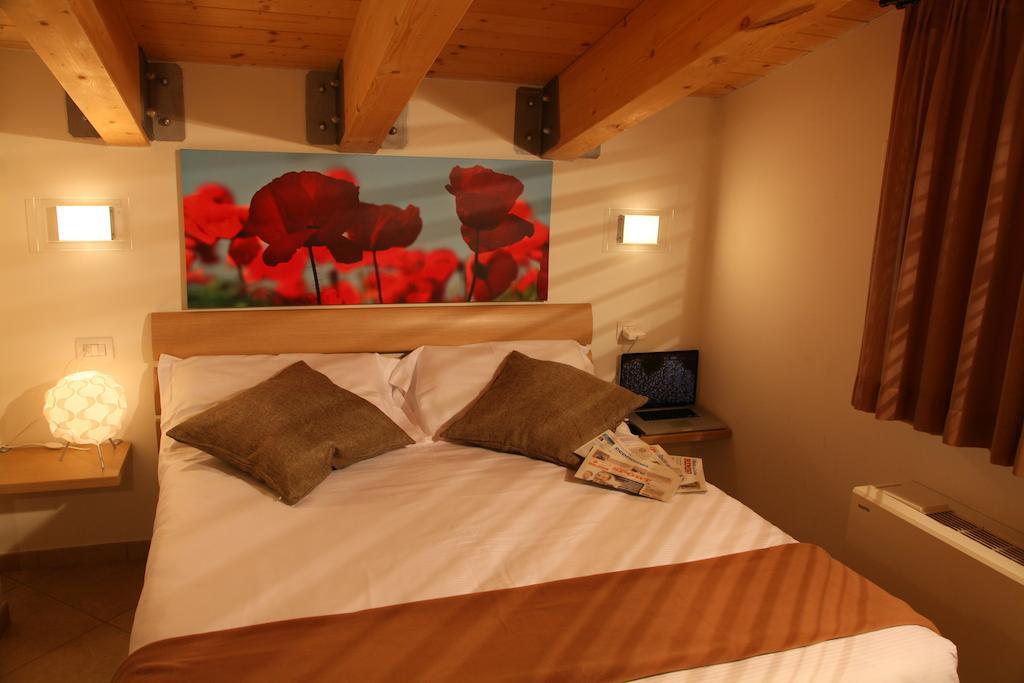 ريتشوني Residence Ilario Suite Hotel الغرفة الصورة